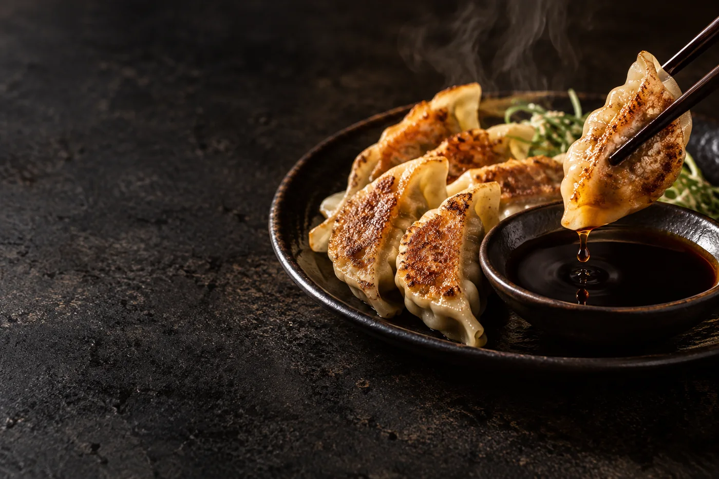Serving inspiration: crisp dumplings dipped in dark soy sauce